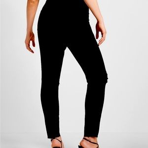NWT size 12 Express Black 5 pocket high waisted ripped jeans with a raw edge.